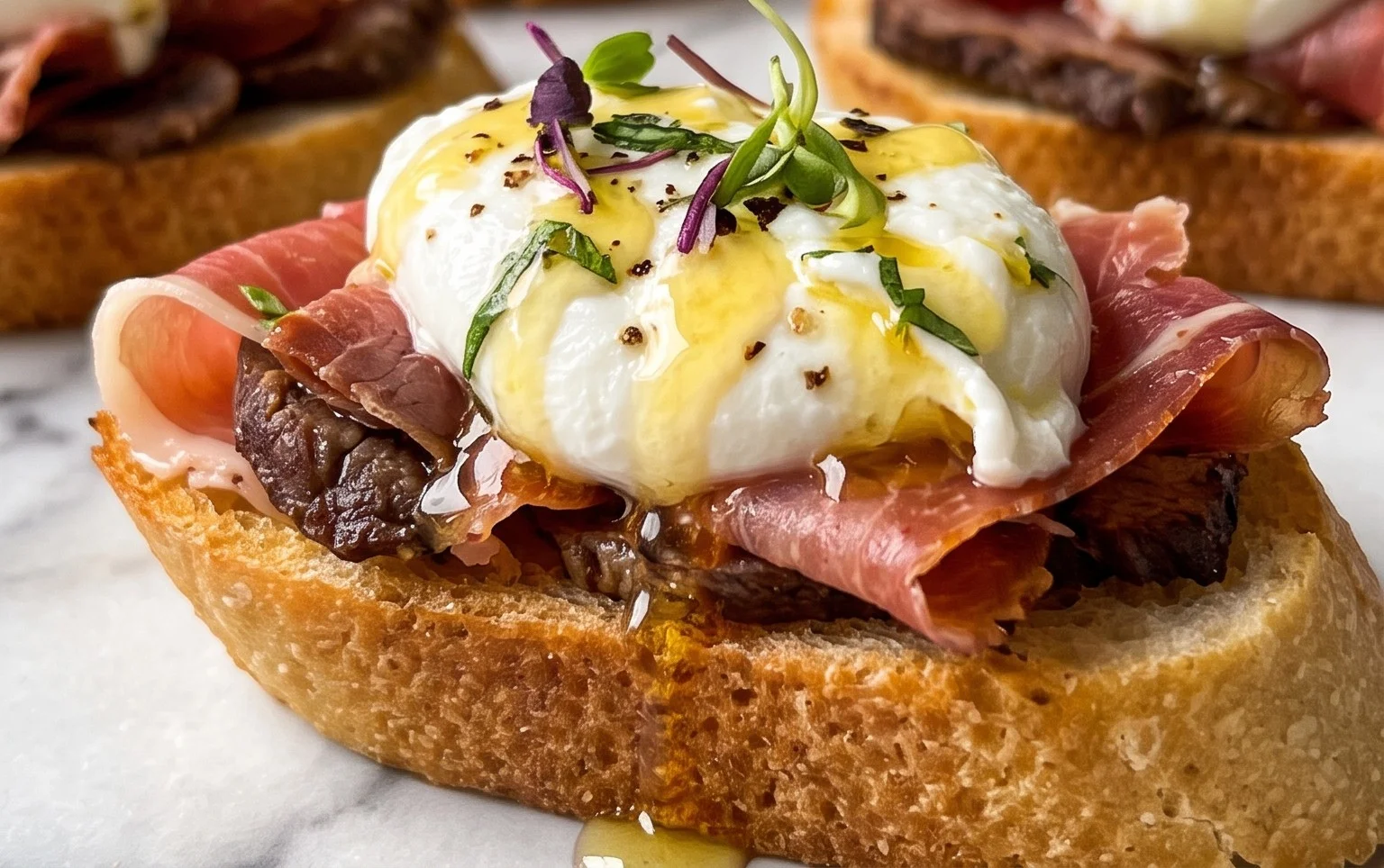 Beef Prosciutto Crostini with Burrata and Lemon Honey Drizzle
