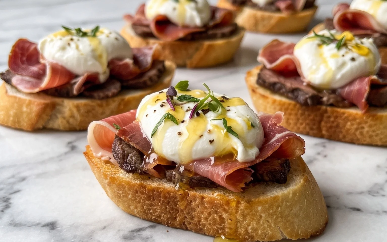 Beef Prosciutto Crostini with Burrata and Lemon Honey Drizzle